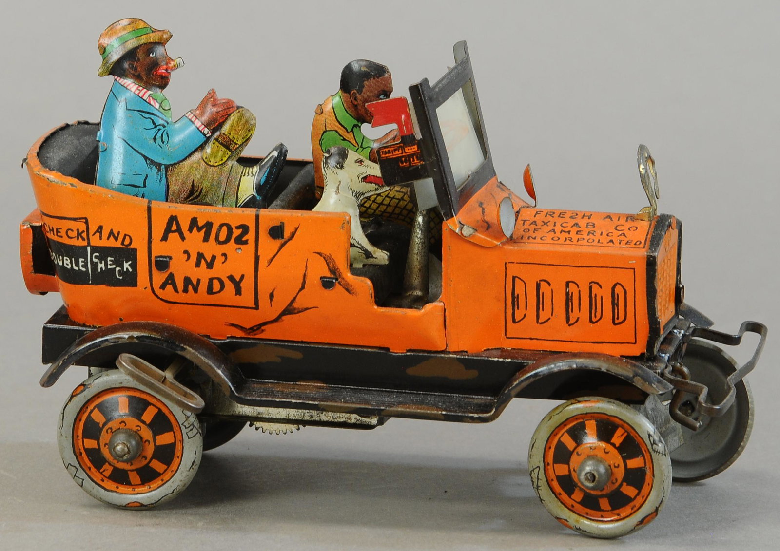 MARX AMOS N ANDY FRESH AIR TAXI: 309. MARX AMOS N ANDY FRESH AIR TAXI | Wind-up and on/off lever working. | Provenance: Paul Cole Collection. | 8" l. | (Exc. Cond.) | $250 - $500