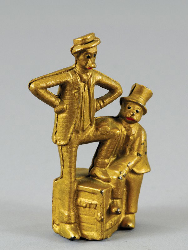 MUTT & JEFF STILL BANK: A.C. Williams, cast iron, painted gold overall. 4 1/4" x 3 1/2".