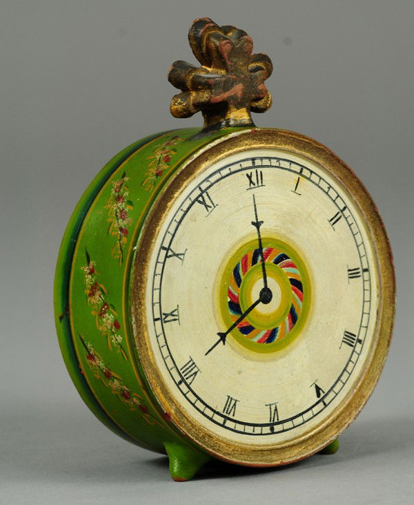 REDWARE CLOCK STILL BANK: An early uniquely painted alarm clock bank, very ornate, finely detailed face with finial décor. 6" h.