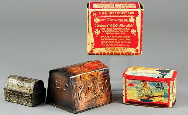 LOT OF TREASURE CHEST BANKS: Grouping includes Capt. Mystery bank in tin, cast iron Treasure Chest still, and Pirate Chest Mystery bank in tin with box. 2 3/4" to 4" l.