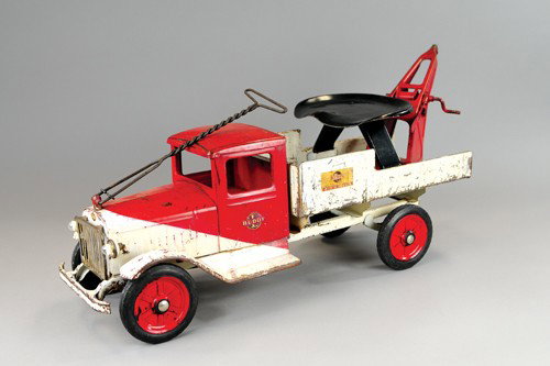 BUDDY 'L' RIDE-EM WRECKING TRUCK: C. 1936, duo-tone slant paint, pull handle and seat, Buddy 'L' bar and circle on doors and body complete, missing only its boom handle. 27" l.