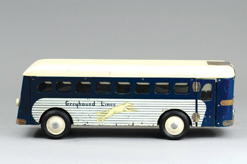 BUDDY 'L' WOODEN GREYHOUND LINES BUS: C. 1940's, adjustable destination scroll above windshield, knob on back pulls to open front door and rings bell. 18" l.
