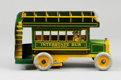 STRAUSS INTERSTATE BUS: Lithographed tin, green and yellow version, upper deck seating, full rear stairs, key wind operated, seated driver. 10 1/2" l.