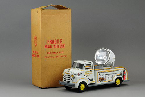 MARX BOXED SEARCHLIGHT TRUCK: Old Store Stock, lithographed tinplate, large toy truck features battery powered light in bed, great graphics overall. 18" l.