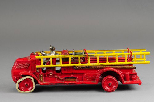 ARCADE LARGE MACK CHEMICAL TRUCK: Great example of early low cab chemical truck, cast iron, painted in red overall, tin ladders on sides, nickel hose reel on service body, seated nickel driver, cast hoses painted black on body sides. 