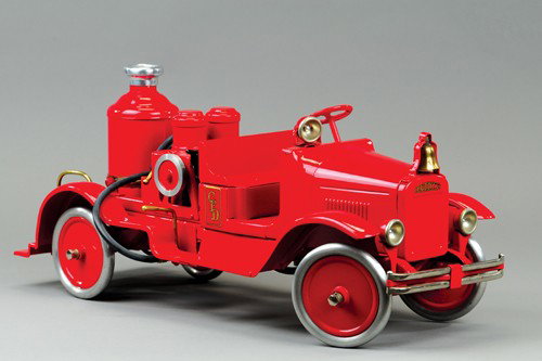 BUDDY 'L' NO. 205-AB FIRE PUMPER TRUCK: C. 1929, squirts real water from hand pumps, boiler, reservoir tank, painted in bright red overall, extensive appointments to apparatus, professionally restored to 100% original toy, boiler, 24" l.