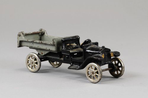 ARCADE MODEL 'T' ANTHONY DUMP TRUCK: Cast iron, black open cab with grey body, opening tailgate, nickel spoke wheels, embossed gate. 8" l.