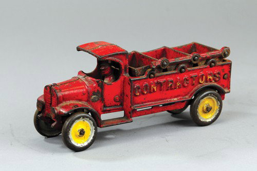 DENT THREE BUCKET CONTRACTOR'S DUMP TRUCK: Cast iron, well detailed toy, 'C' Mack cab with cast driver, open frame body features three dump buckets, able to tilt by side levers, embossed sides. 8 1/2" l.