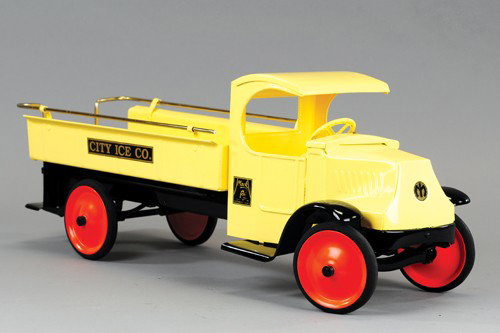 STEELCRAFT ICE TRUCK: C. 1926, complete older restoration done in non Steelcraft colors of yellow cab and body, black fenders, features brass railed body and rear platform, decals on sides, rubber tires, orange painted dis
