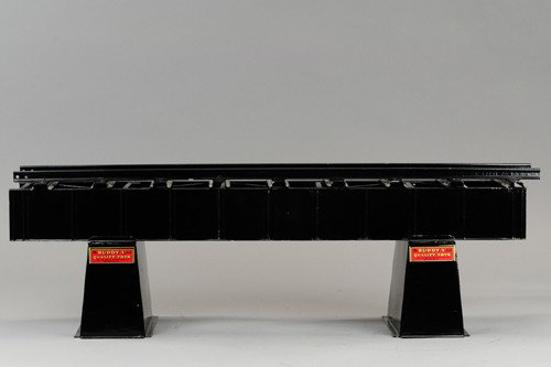 BUDDY 'L' TRESTLE: Bridge section resting on two bridge pieces, c. 1929-32, includes one section of track, all are original professional restorations. 30" l.
