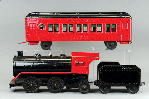 COR COR TRAIN ENGINE, TENDER AND COACH: Corcoran Mfg. Co., Washington, pressed steel, done in red and black, nice three piece set with hitch for pulling together, bell appears on boiler with railed sides, some play wear. 45" overall length.