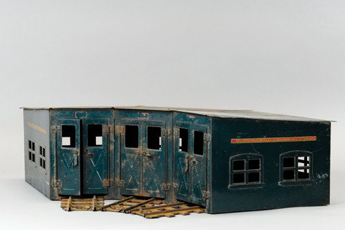 BUDDY 'L' OUTDOOR RAILROAD THREE STALL ROUNDHOUSE: C. 1929-32, used with Industrial Train Set accessory, original with surface rust to roof. 35" l x 33" w.
