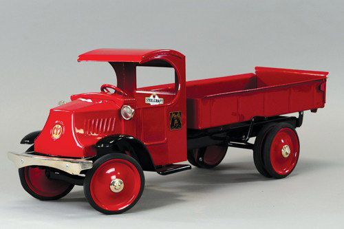 STEELCRAFT MACK HAND RAIL DUMP TRUCK: Mack 'C' cab painted in red, dual rear wheels, deluxe headlight and nickel bumper, professional restoration by New Era, a great look overall. 26" l.