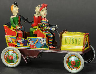 HANS EBERL TA-RA-RA-BUMM CLOWN CAR: 163. HANS EBERL TA-RA-RA-BUMM CLOWN CAR | 7" l. | Common minor factory touch-ups to clown arms and car frame, (Exc. Cond.) | $1,200 - $1,800