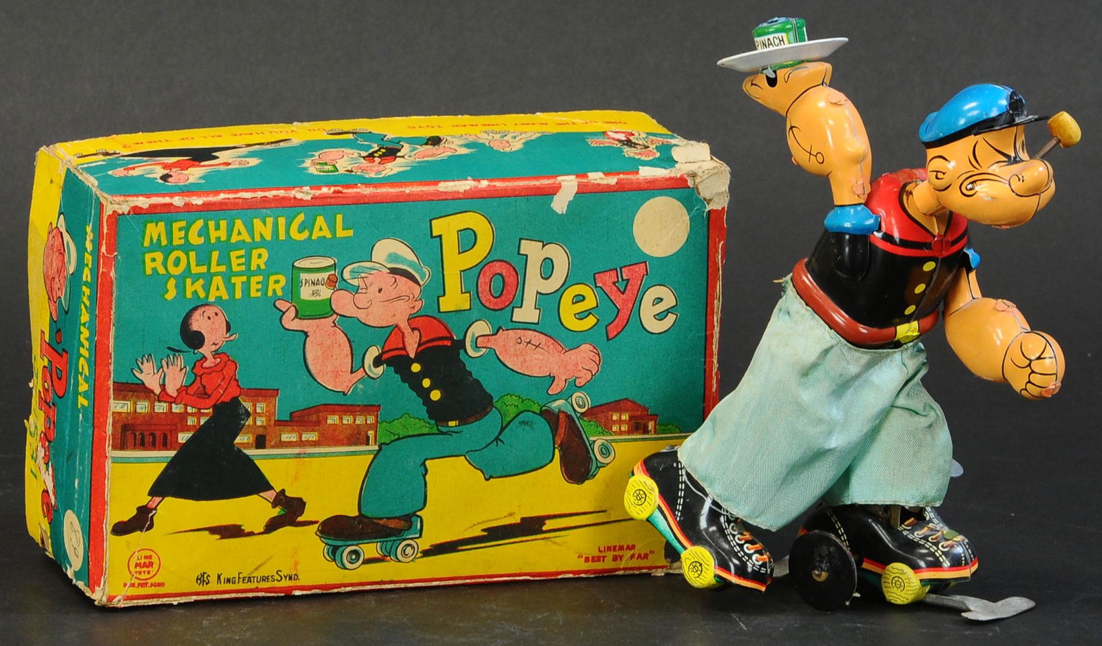 BOXED LINEMAR POPEYE ROLLER SKATER: 211. BOXED LINEMAR POPEYE ROLLER SKATER | 6 " h. | Lid of box is relined on inside, toy in (Pristine Cond.) | $500 - $750