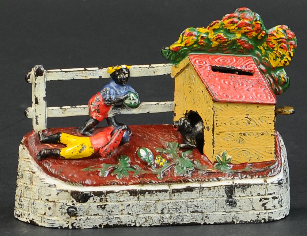 BOY STEALING WATERMELON MECHANICAL BANK (1 of 4)