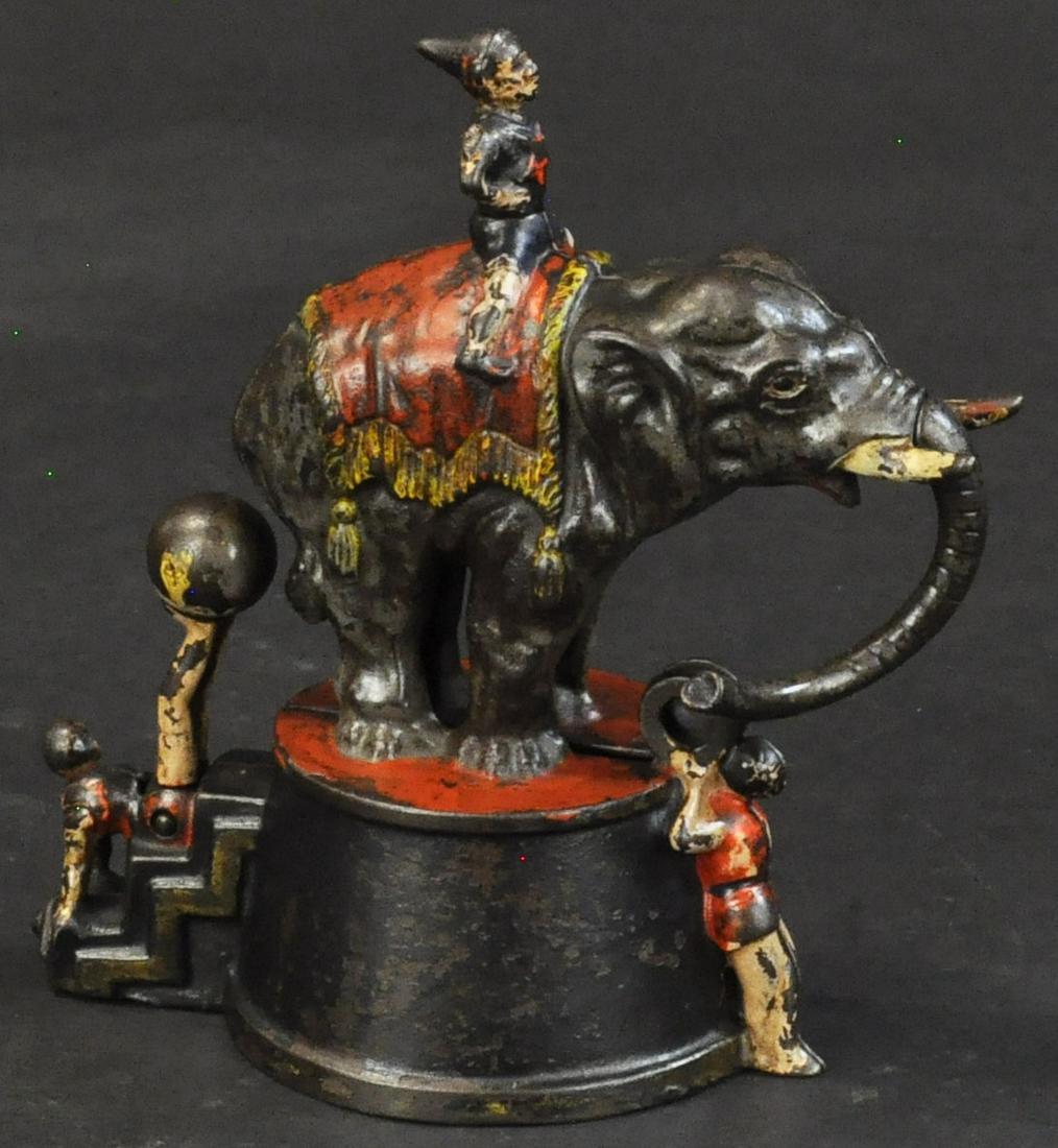 ELEPHANT AND THREE CLOWNS MECHANICAL BANK (1 of 4)