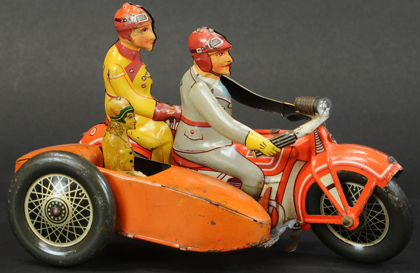 TIPPCO FAMILY CYCLE W/SIDECAR: 1139. TIPPCO FAMILY CYCLE W/SIDECAR | 10" l. | Minor touch-up to underside near the battery box, (VG Cond.) | $1,000 - $1,500