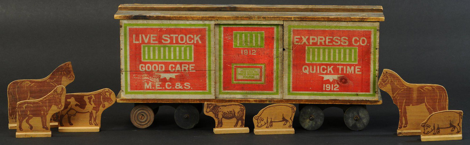 CONVERSE LIVESTOCK CAR: 1401. CONVERSE LIVESTOCK CAR | 19" l. | Half of one door is missing, six replaced wheels, (VG Cond.) | $200 - $300