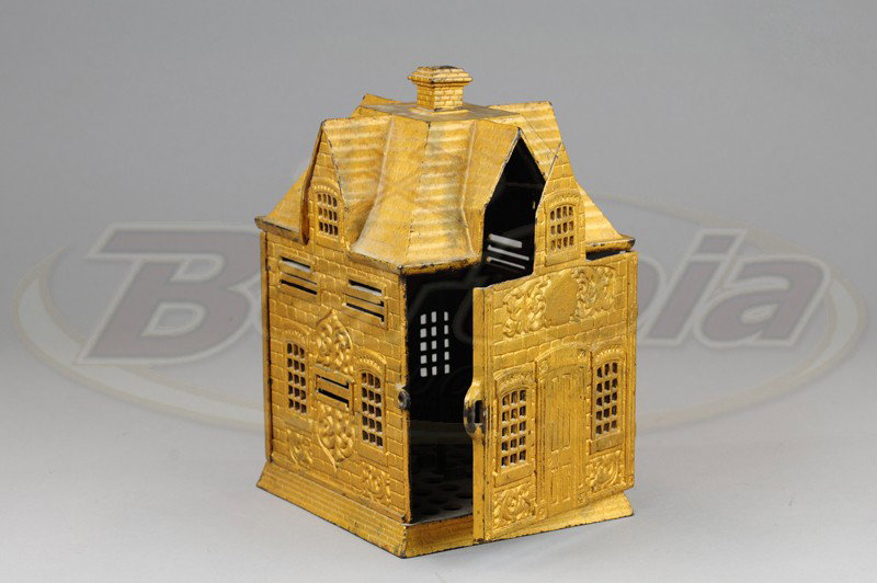 PROPERTY OF CENTRAL SAVINGS STILL BANK: Large scale cast iron building bank, rear door opens, well embossed overall, coin and bill slots at sides. 10 3/4" h.