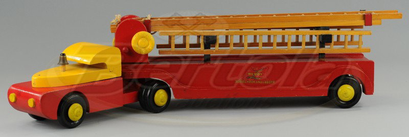 BUDDY 'L' WOODEN HOOK & LADDER TRUCK: C. 1943, red and yellow cab, open service trailer contains wood extension ladders and side mount ladders, decals on sides. 37 1/2" l.