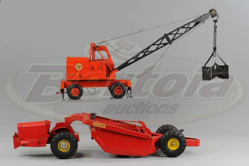 LOT OF TWO MODEL CONSTRUCTION TOYS: Includes boxed "Heilner" road scraper in red and a "Unit" steam shovel in orange with black shovel and long boom. 18" to 28" l.