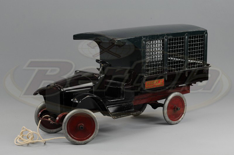 BUDDY 'L' RAILWAY EXPRESS: C. 1925, pressed steel screen side model, open cab done in black, green canopy top body and screen sides, painted green, features opening rear door, disc wheels, all original. 25" l.