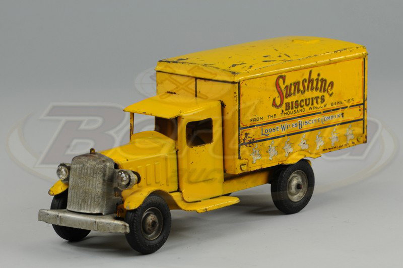 SUNSHINE BISCUITS: Metalcraft, pressed steel truck with van body containing logo on sides, electric lights, rubber tires. 12 1/2" l.