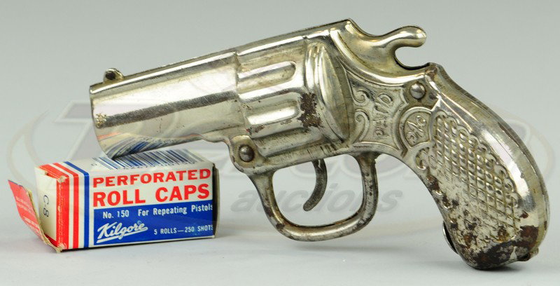 PISTOL STILL BANK: Manufactured by Richard Elliot Co., pat. 9/21/1909, place a dime in the end of the barrel, pull the trigger and a lever on the inside moves and snaps onto the coin and deposits it into the butt of the
