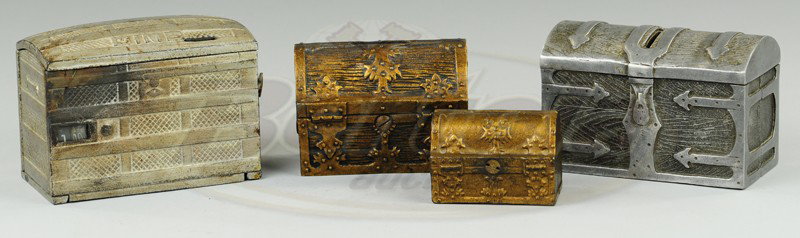 GROUPING OF TRUNKS AND TREASURE CHEST STILL BANKS: Cast iron lot features two treasure chest figural banks, old trunk and simulated wood trunk bank, painted in gold and silver. 2 3/4".