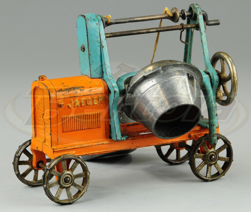 LARGE JAEGER CONCRETE MIXER: Kenton, cast iron, painted orange overall with blue frame, large aluminum drum and scoop, nickeled disc wheels. 9 1/4" l.