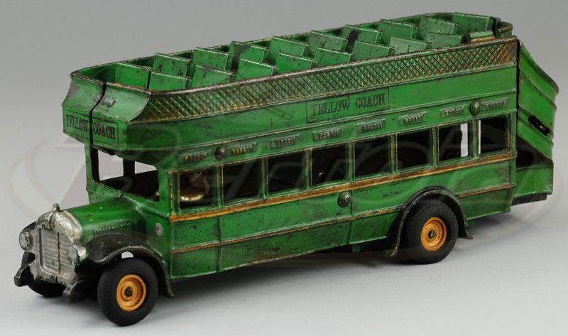 ARCADE "YELLOW COACH" DOUBLE DECK BUS: Large scale cast iron intercity bus, painted in green with black fenders, nickel driver, stenciled sides and front upper deck seating, rear stairs. 13 1/4" l.