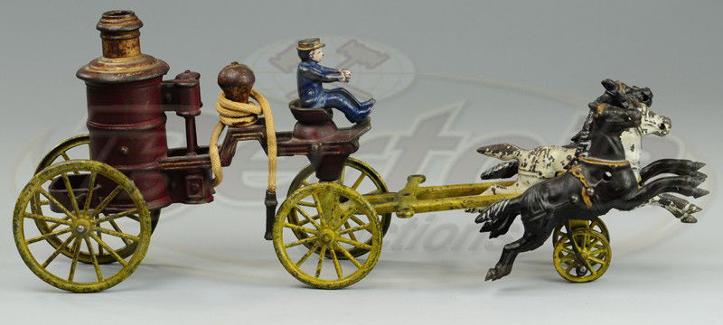 HUBLEY HORSE DRAWN FIRE ENGINE: Cast iron, red wagon with open bench seat and vertical boiler, drawn by three horse team, yellow spoke wheels. 18" l.