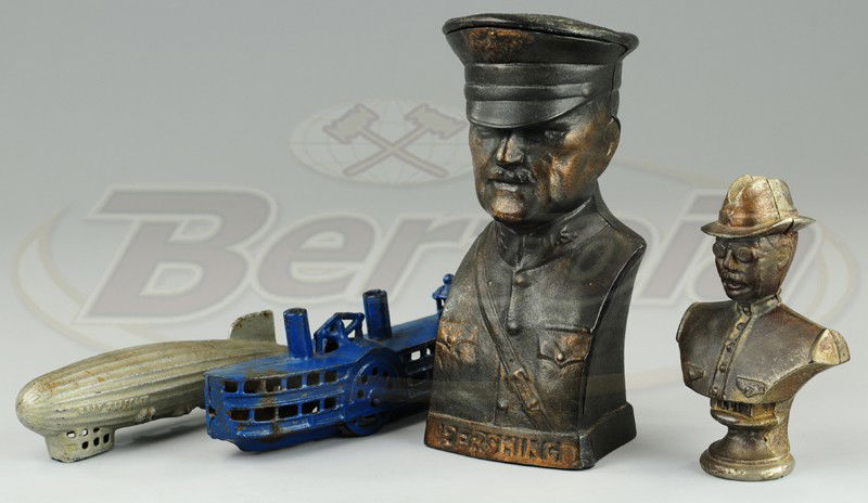 LOT OF CAST IRON STILL BANKS: Assorted figural still banks includes General Pershing bust, Teddy on pedestal with traces of nickeling finish, blue steam boat and silver Graf zeppelin. 6" w x 7 3/4" h.