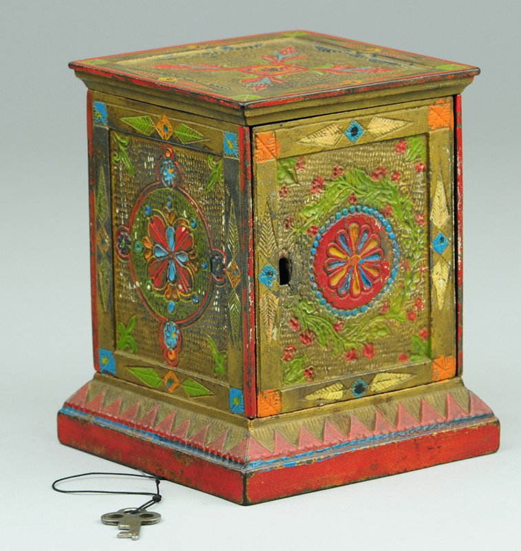 GEOMETRIC SAFE STILL BANK: Kyser & Rex, c. 1882, colorfully painted overall, very scarce cast iron example, one in a famed series of vault safe banks, includes key. 5 3/8" h.