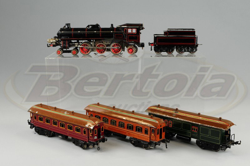 BING 'O' GAUGE TRAIN SET: Includes 4-6-2 18 volt III engine and eight wheel tender, together with two dining cars and baggage car, all hand painted roofs, lithographed bodies. Cars 12" l.