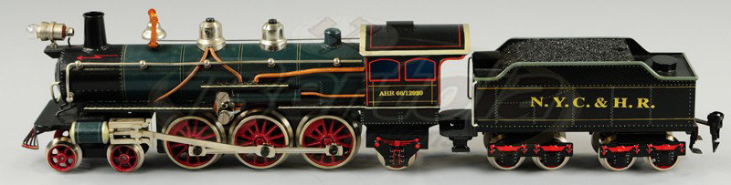 SELZER AHR 66/12920: N.Y.C locomotive and tender, 'O' gauge example, contemporary rendition of Marklin's 4-6-2 loco, done in green boiler, black frame, great details, stamped tender. 19" overall length.