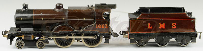 BASSETT- LOWKE O GAUGE LOCOMOTIVE: 4-4-0 clockwork locomotive, painted in deep brown, reads 1063 on engine, LMS on tender, clockwork mechanism. 15" overall length.