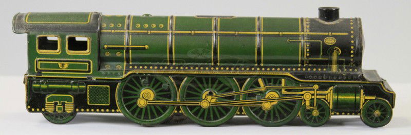 TIPPCO TRAIN LOCOMOTIVE: Germany, lithographed tin, done in green overall, great graphics, key wind operated with bellows. 12 1/2" l.
