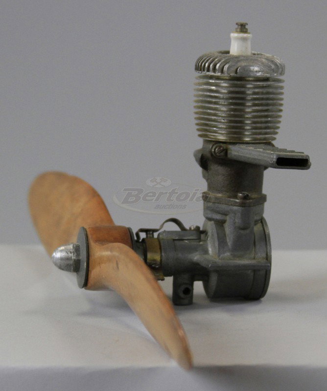 BABY CYCLONE ENGINE: Contains spark plug with wood propeller. 14" prop. span.