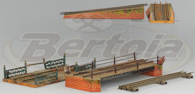 MARKLIN BRIDGE: Hand painted tin, center span with side approaches, lot includes Bing accessory, simulated brick work embossed sides.