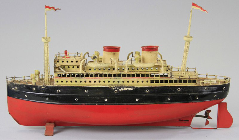 FLEISCHMANN CLOCKWORK OCEANLINER: Hand painted tin, red and black hull, upper deck features cabin, pilot's house, two masts and funnels, four lifeboats and railed stern and bow. 19" l.