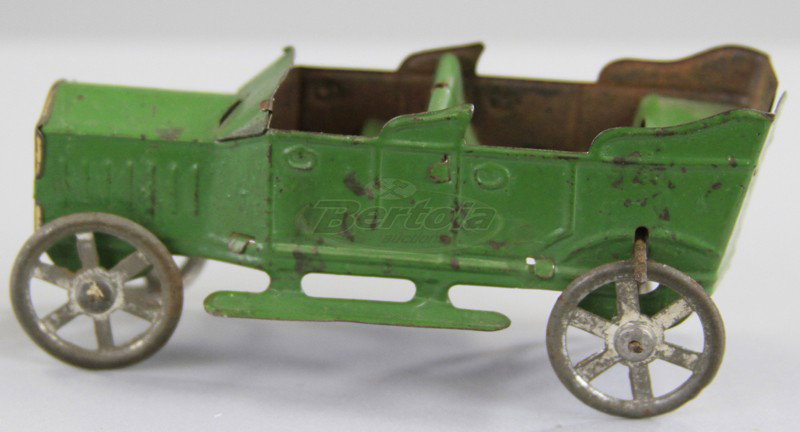 FRENCH OPEN TOURER PENNY TOY: Painted in green overall, spoke wheels with fly wheel at rear axle, embossed SMJ, France. 4 1/2" l.