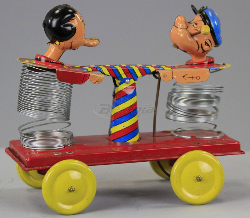 POPEYE AND OLIVE OYL STRETCHY HAND CAR: Linemar, Japan, lithographed tin, amusing toy depicts popular characters with spring bodies attached on hand car, key wind operated. 7" l.