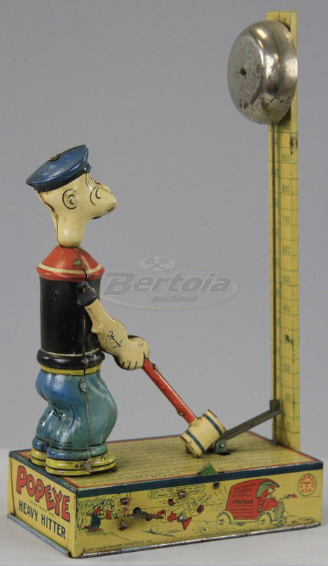 POPEYE HEAVY HITTER: Chein, lithographed tin, c. 1932 King Features Synd., depicts Popeye with sledge hammer in hand able to strike amusement game strength tester when key wind is operated, bell rings if struck to top. 11