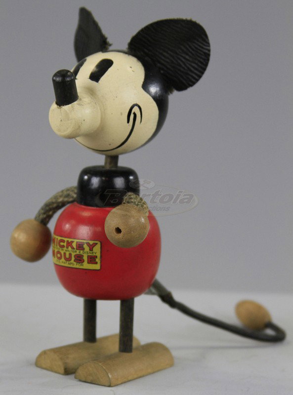 MICKEY MOUSE FLEX FIGURE: Scarce version, decal reads 1928, 1939, copy. Walter E. Disney, wooden body with rope arms and tail, label on red shorts intact, leather ears, wood feet and ball hands. 6" h.