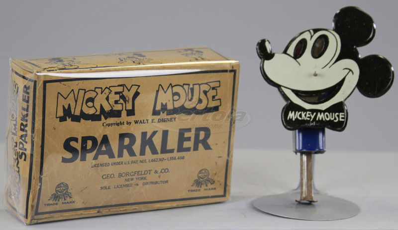 BOXED MICKEY MOUSE SPARKLER: Lithographed tin, bust of Mickey in black and white, nice sparking action when plunger is depressed. 5 1/2" h.