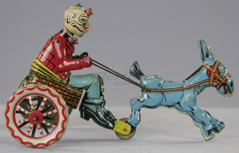 INGAP HAPPY HOOLIGAN RIDING DONKEY CART: Italy, lithographed tin, red jacket version, comical toy with colorful double sided spoke wheels, blue donkey, key wind operated. 6 3/4" l.