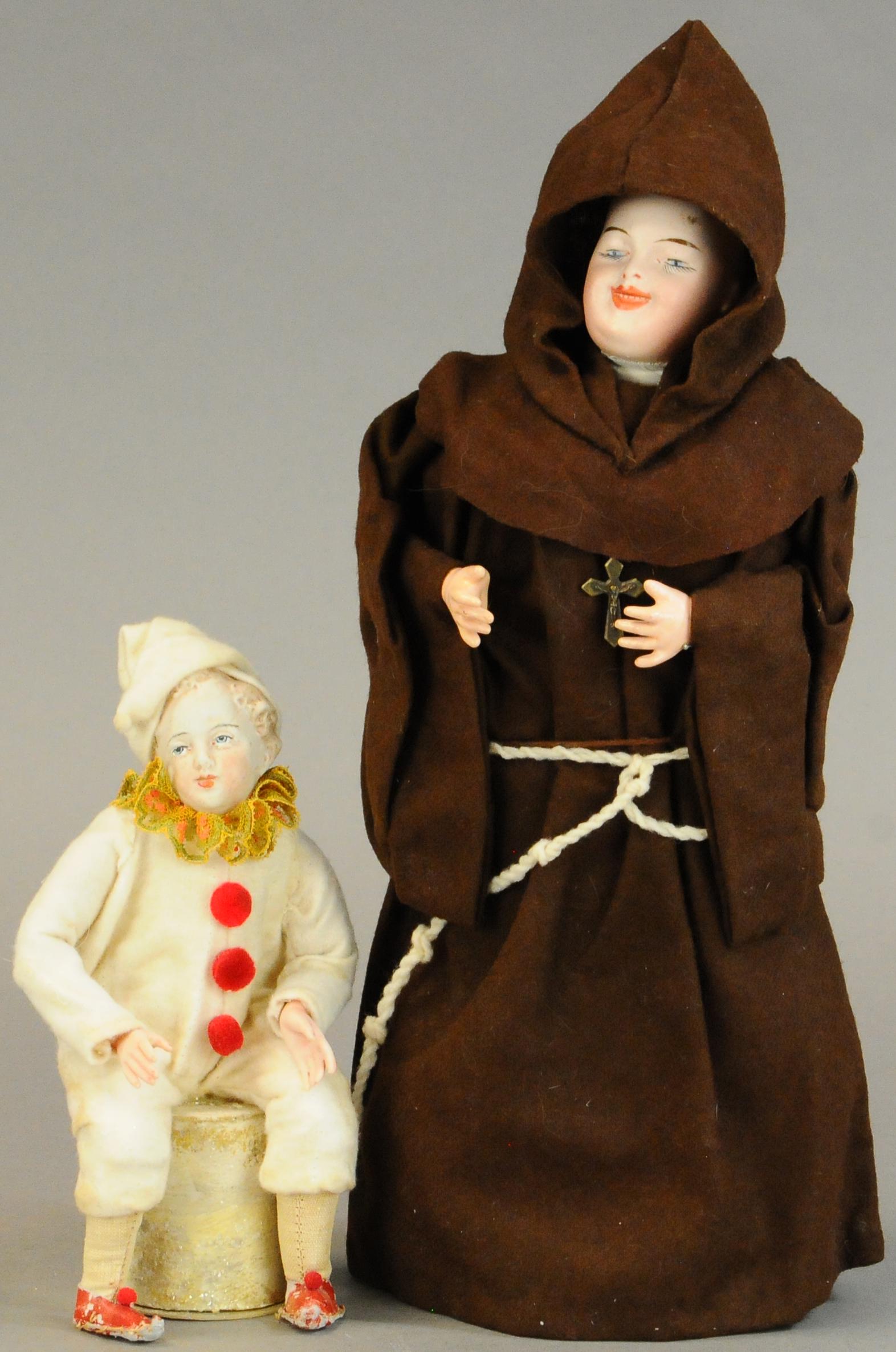 TWO BISQUE HEAD CANDY CONTAINERS (1 of 3)