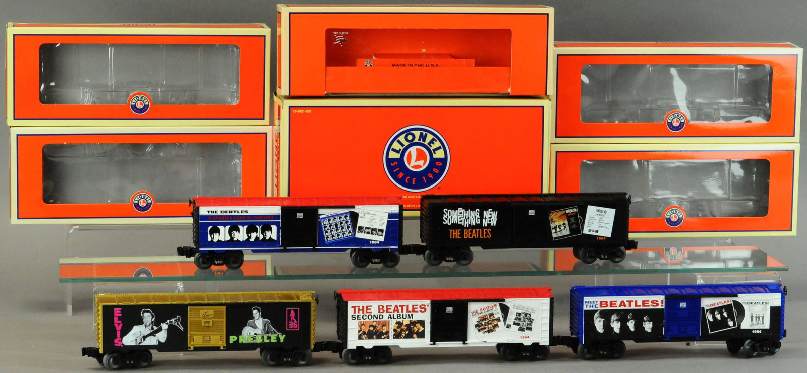 LIONEL COMMEMORATIVE ELVIS & BEATLES CARS: 262. LIONEL COMMEMORATIVE ELVIS & BEATLES CARS | 0 gauge. | 10" l. | (Near Mint Cond.) | $100 - $200